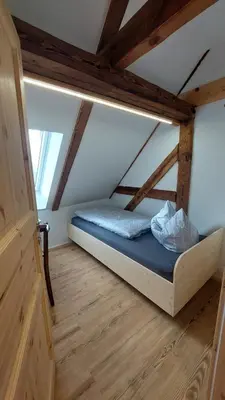 Ein Bett oder Betten in einem Zimmer der Unterkunft Oderlandblick Apartment