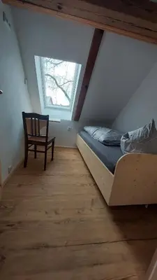 Ein Bett oder Betten in einem Zimmer der Unterkunft Oderlandblick Apartment