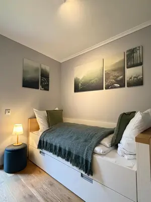 Ein Bett oder Betten in einem Zimmer der Unterkunft Auszeit am See mit Kamin und Whirlpool, Nähe Berlin