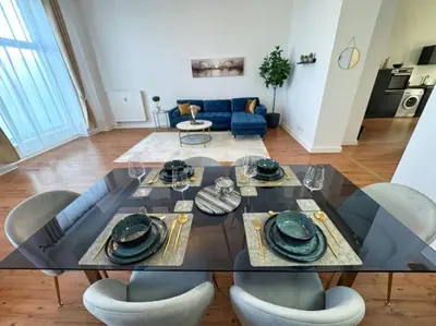 Ein Sitzbereich in der Unterkunft HolidayHome Apartments l Spacious Luxury Apartment in Prenzlauer Berg