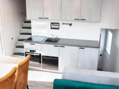 Küche/Küchenzeile in der Unterkunft schwimmendes Ferienhaus in Berlin