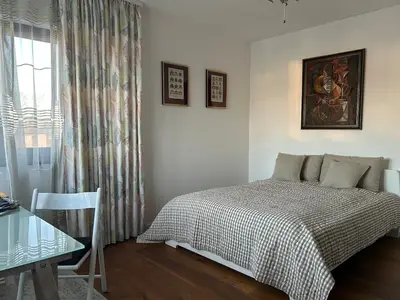 Ein Bett oder Betten in einem Zimmer der Unterkunft Artvilla am See