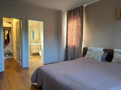 Ein Bett oder Betten in einem Zimmer der Unterkunft Artvilla am See