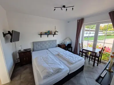Ein Bett oder Betten in einem Zimmer der Unterkunft Galgenberghof Müncheberg