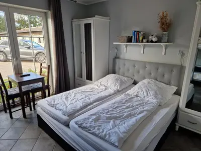 Ein Bett oder Betten in einem Zimmer der Unterkunft Galgenberghof Müncheberg