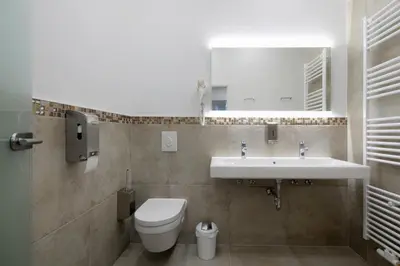 Ein Badezimmer in der Unterkunft Familienstudio 27