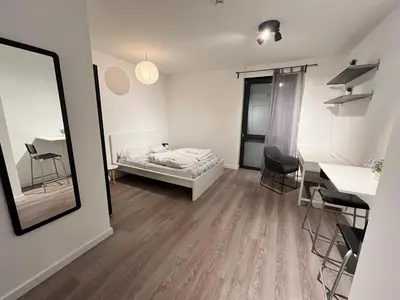 Ein Bett oder Betten in einem Zimmer der Unterkunft Berlin Central Apartment