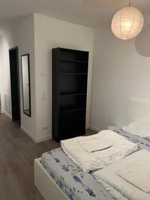 Ein Bett oder Betten in einem Zimmer der Unterkunft Berlin Central Apartment