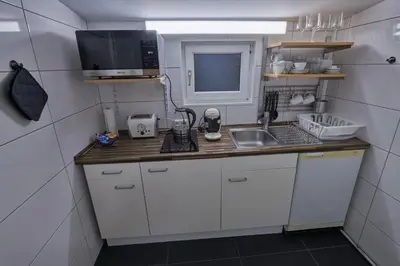 Küche/Küchenzeile in der Unterkunft Onebnb Gästehaus mit Terrasse in Berlin-Süd