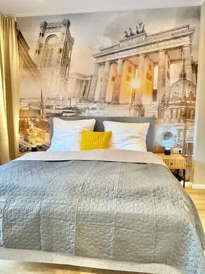 Ein Bett oder Betten in einem Zimmer der Unterkunft Lichtdurchflutetes Design-Apartment U39-1