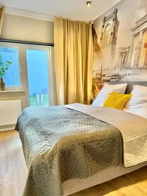 Ein Bett oder Betten in einem Zimmer der Unterkunft Lichtdurchflutetes Design-Apartment U39-1