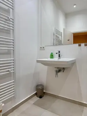 Ein Badezimmer in der Unterkunft Elegantes Single-Apartment U39-3