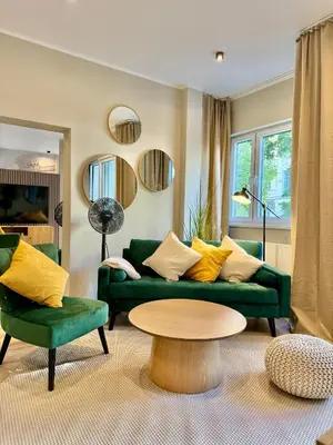 Ein Sitzbereich in der Unterkunft Elegantes Single-Apartment U39-3