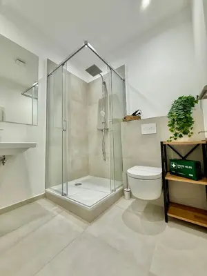 Ein Badezimmer in der Unterkunft Elegantes Single-Apartment U39-3