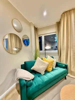 Ein Sitzbereich in der Unterkunft Elegantes Single-Apartment U39-3
