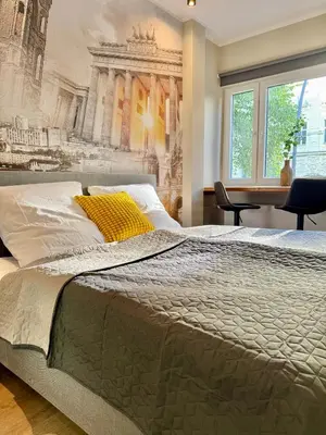 Ein Bett oder Betten in einem Zimmer der Unterkunft Design-Studio mit Balkon U39-2