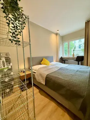 Ein Bett oder Betten in einem Zimmer der Unterkunft Design-Studio mit Balkon U39-2