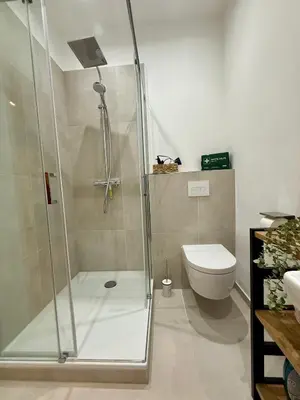 Ein Badezimmer in der Unterkunft City-Apartment mit Balkon U39-4