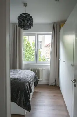 Ein Bett oder Betten in einem Zimmer der Unterkunft Modern 3-room apartment on Kurfürstendamm City-West