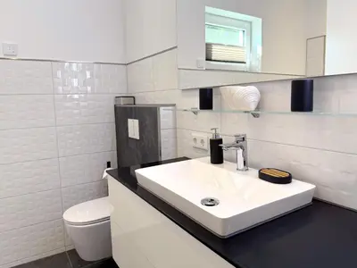 Ein Badezimmer in der Unterkunft Ferienwohnung-Karwe