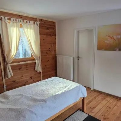 Ein Bett oder Betten in einem Zimmer der Unterkunft HerbergeZumBrieselang