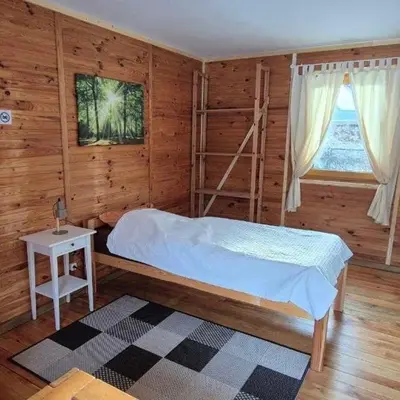 Ein Bett oder Betten in einem Zimmer der Unterkunft HerbergeZumBrieselang