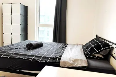 Ein Bett oder Betten in einem Zimmer der Unterkunft HolidayHome Apartments I Modern Apartment in Berlin-Lichtenberg