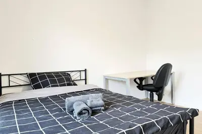 Ein Bett oder Betten in einem Zimmer der Unterkunft HolidayHome Apartments I Modern Apartment in Berlin-Lichtenberg