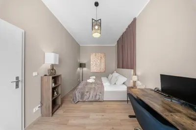 Ein Bett oder Betten in einem Zimmer der Unterkunft Loftly Modersohnstr nähe East Side Gallery nähe Uber Arena