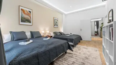 Ein Bett oder Betten in einem Zimmer der Unterkunft Gemütliches Apartment in Wedding - 75QM