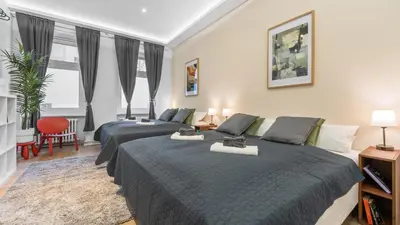 Ein Bett oder Betten in einem Zimmer der Unterkunft Gemütliches Apartment in Wedding - 75QM