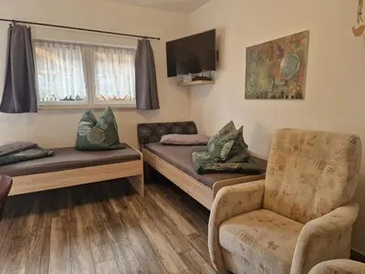 Ein Sitzbereich in der Unterkunft Small vacation apartment
