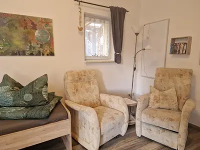 Ein Sitzbereich in der Unterkunft Small vacation apartment