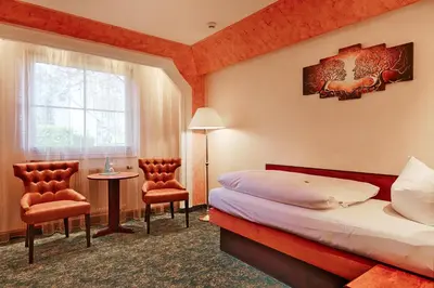 Ein Bett oder Betten in einem Zimmer der Unterkunft Hotel Aragon