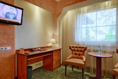 Ein Sitzbereich in der Unterkunft Hotel Aragon