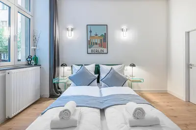 Ein Bett oder Betten in einem Zimmer der Unterkunft Wunderschönes großes Altbau Apartment