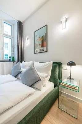 Ein Bett oder Betten in einem Zimmer der Unterkunft Wunderschönes großes Altbau Apartment