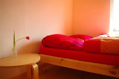 Ein Bett oder Betten in einem Zimmer der Unterkunft Gutshaus Buberow - Loft - für Seminare & Gruppen