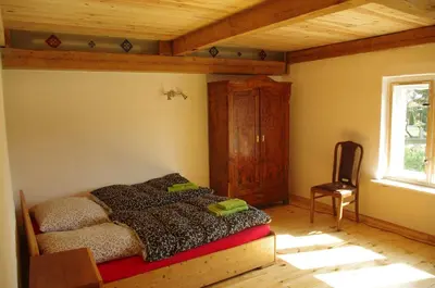 Ein Bett oder Betten in einem Zimmer der Unterkunft Gutshaus Buberow - Loft - für Seminare & Gruppen