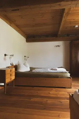 Ein Bett oder Betten in einem Zimmer der Unterkunft Gutshaus Buberow - Loft - für Seminare & Gruppen