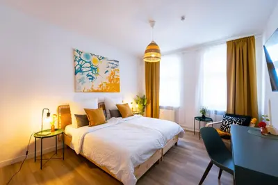 Ein Bett oder Betten in einem Zimmer der Unterkunft BetterBeds Wilhelm City