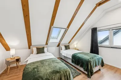 Ein Bett oder Betten in einem Zimmer der Unterkunft Ludwigsfelde Comfort Stay - 3BR Apartment