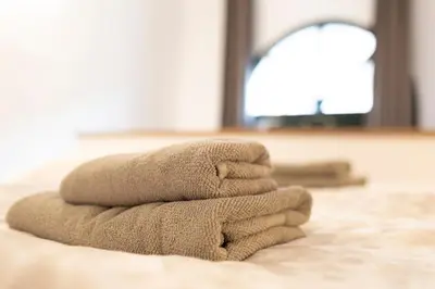 Ein Bett oder Betten in einem Zimmer der Unterkunft Jomi Stays Berlin - Kudamm