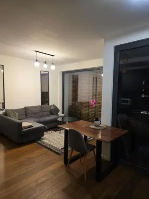 Ein Sitzbereich in der Unterkunft Bergmann Apartments by Acar