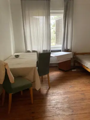 Ein Bett oder Betten in einem Zimmer der Unterkunft 1,5 Zimmer am See, for business travellers only