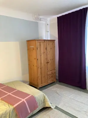 Ein Bett oder Betten in einem Zimmer der Unterkunft 1,5 Zimmer am See, for business travellers only