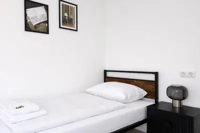 Ein Bett oder Betten in einem Zimmer der Unterkunft NOVA by Comfort Housing - 2 bedroom apartment