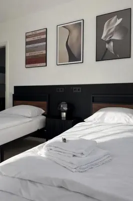 Ein Bett oder Betten in einem Zimmer der Unterkunft NOVA by Comfort Housing - 2 bedroom apartment