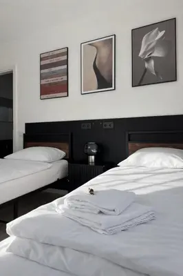 Ein Bett oder Betten in einem Zimmer der Unterkunft NOVA by Comfort Housing - 2 bedroom apartment