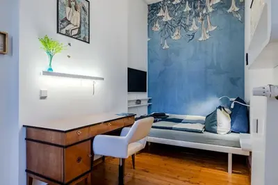 Ein Bett oder Betten in einem Zimmer der Unterkunft Stylish apartment near Ku 'damm